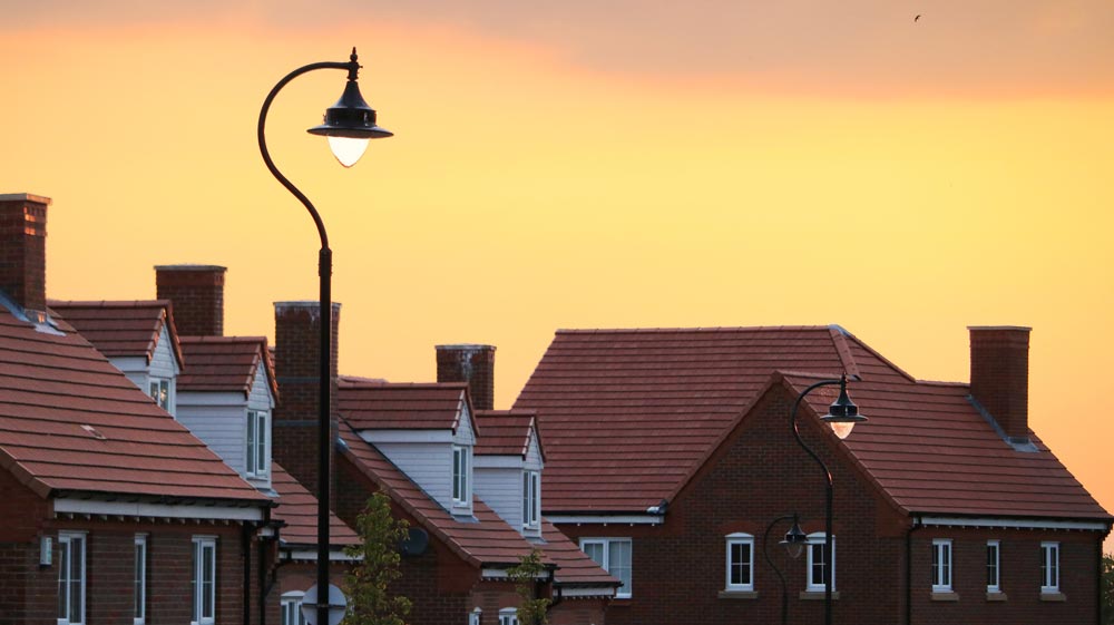 Image of UK houses at sundown.